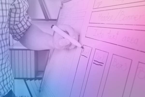 Web designer focusing on conversion-oriented design elements on a website, enhancing online sales strategy