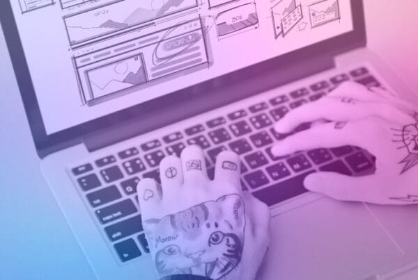 Web designer optimising a user-centric website interface on a computer screen, focusing on seamless user experience